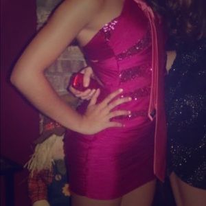 Tight pink homecoming dress.