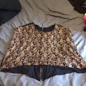Unique gold and black top