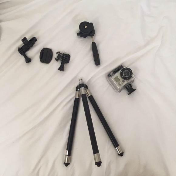 GoPro 1, three clips, stand, and hand held.