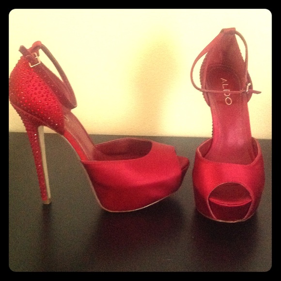 Red jeweled, peep toe stilettos!