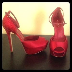 Red jeweled, peep toe stilettos!