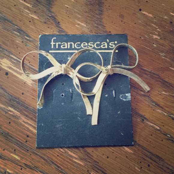 large gold bow earrings from francesca's boutique.