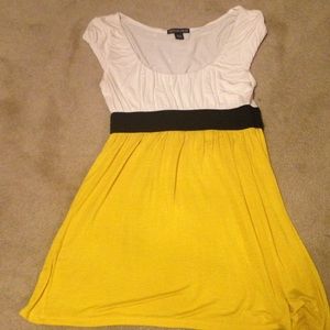 White and yellow top with black waistband