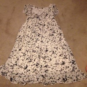 Off white/black dress w/ ruffle bottom & neckline