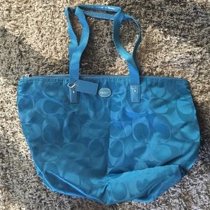 Blue coach weekender and makeup case