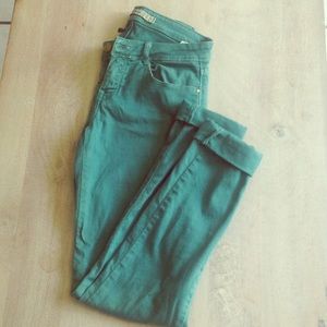 Emerald green, slim cut jeans.