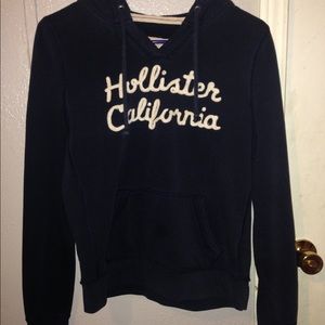 Hollister navy blue pull-over hoodie.