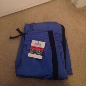 Pink sweats and hair ties