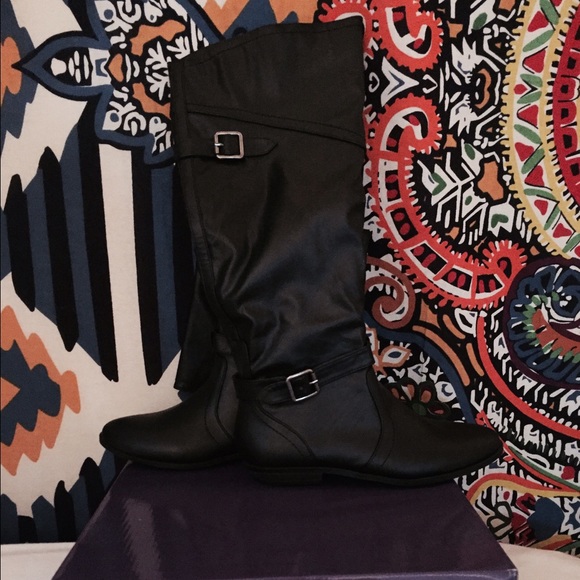 Black leather knee high boots