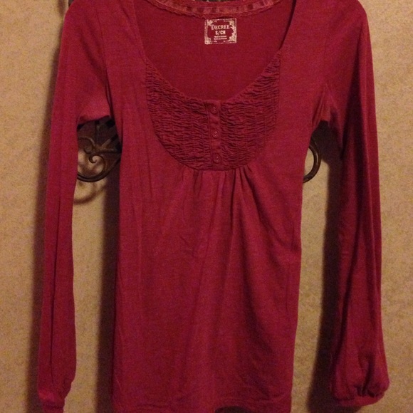 Maroon top with a tie in the back