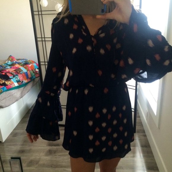 Long sleeve, flowy navy dress with 3/4 button up