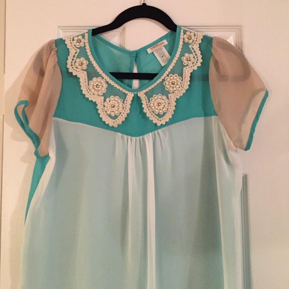 Jeweled collar blouse.