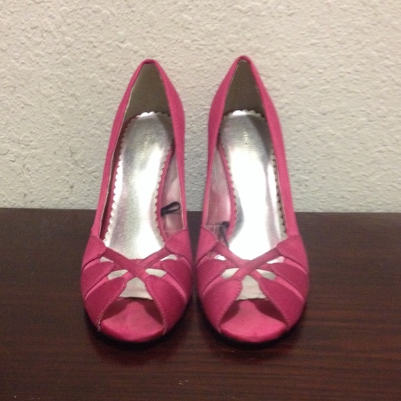 Pink open toed high heeled shoes