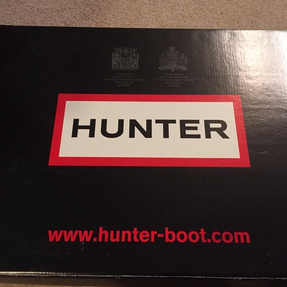 Pink and black hunter boots
