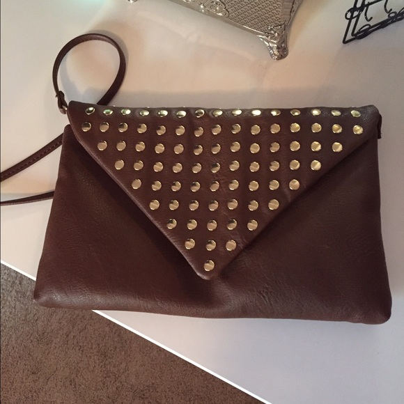 Small, brown studded hand bag