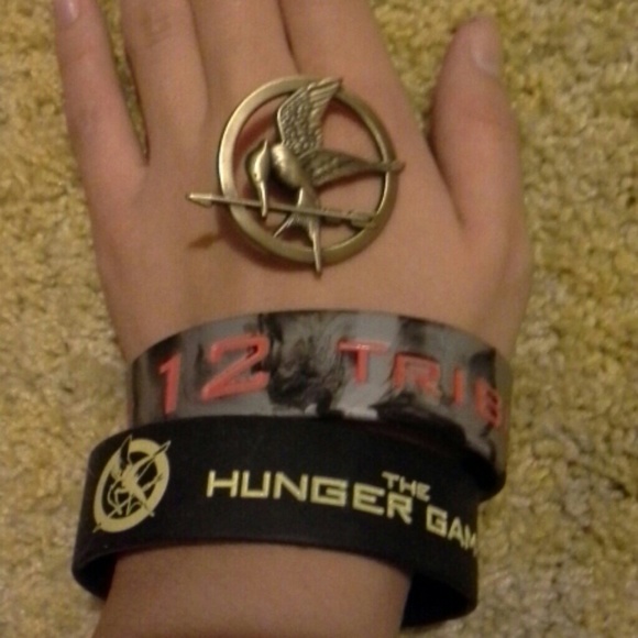 fye Jewelry - Hunger Games bracelet and pin