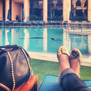 REDUCED Gold/gold Reva Tory Burch Flats like new