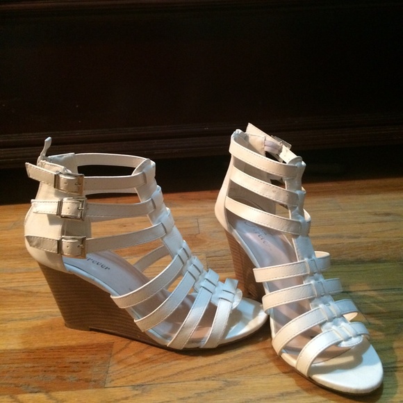 White wedge sandals.