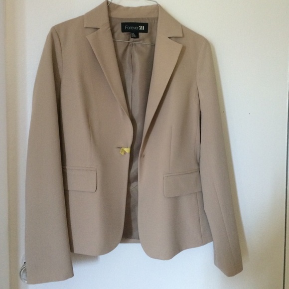 Tan suit jacket.