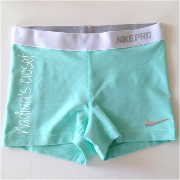 teal nike pros