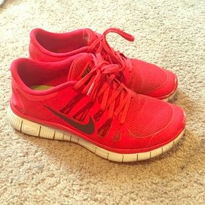 Men's red nike free run sneakers