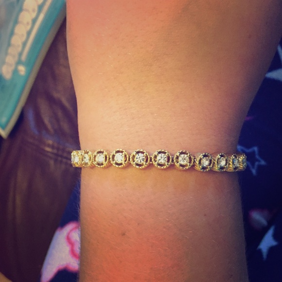 Gold bracelet with round cubic zirconium accents