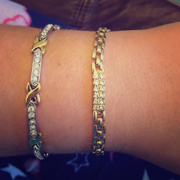 2 gold bracelets with cubic zirconium accents