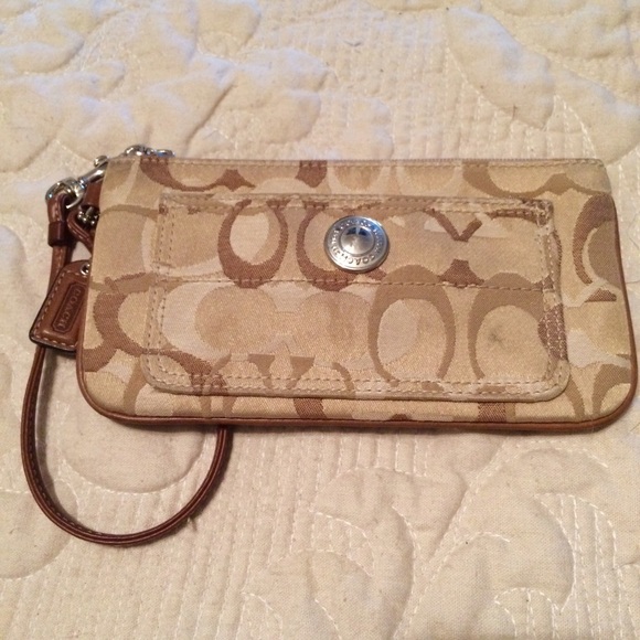 Coach logo clutch in coached canvas