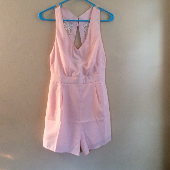Super cute, never been worn pink romper