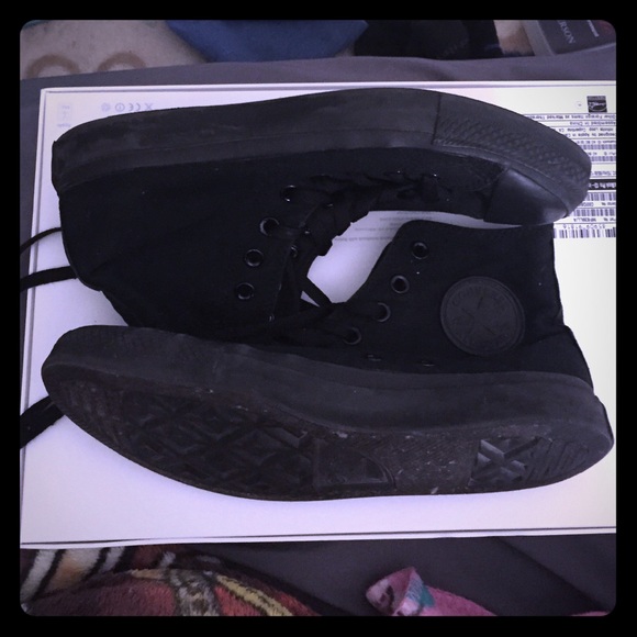 All black high top Converse