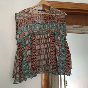 Printed top. Sheer with layers.