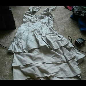 A ruffled 5.7.9 beige halter top dress