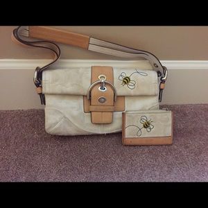Small coach purse and matching small wallet.