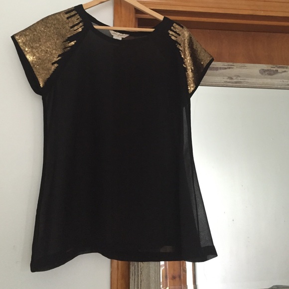 Sheer black chiffon tee shirt with gold sleeves