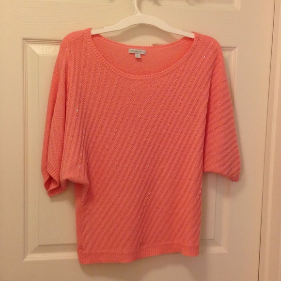 Coral sweater with sparkle appeal