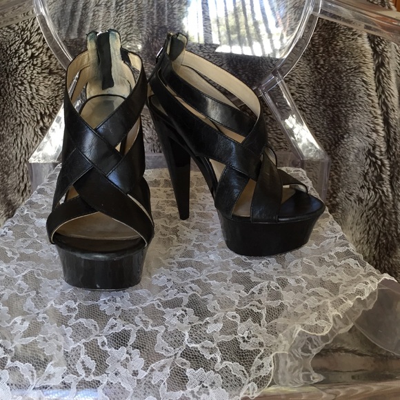 Vampy black leather Michael Kors platforms