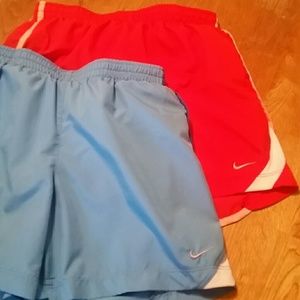 Two Nike shorts- Baby blue and Bright orange!