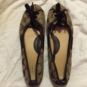 Brown coach shoe