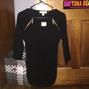 Black with gold zippers Michael kors