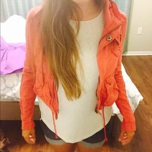 Salmon colored crop jacket from Free People