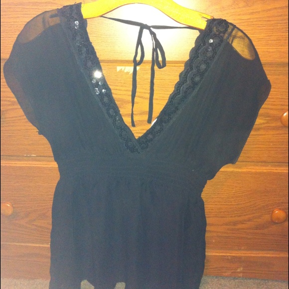 Dressy black sheer top size medium gently loved!