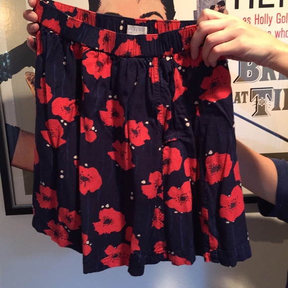 Urban Outfitters Dresses & Skirts - Navy mini-skirt with red poppies