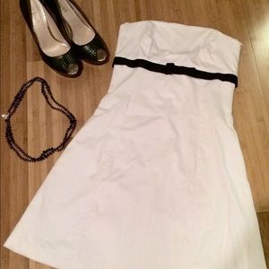 White strapless dress with black belt