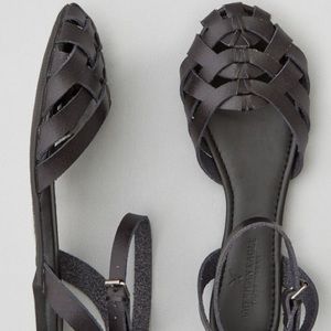 Black strappy flats