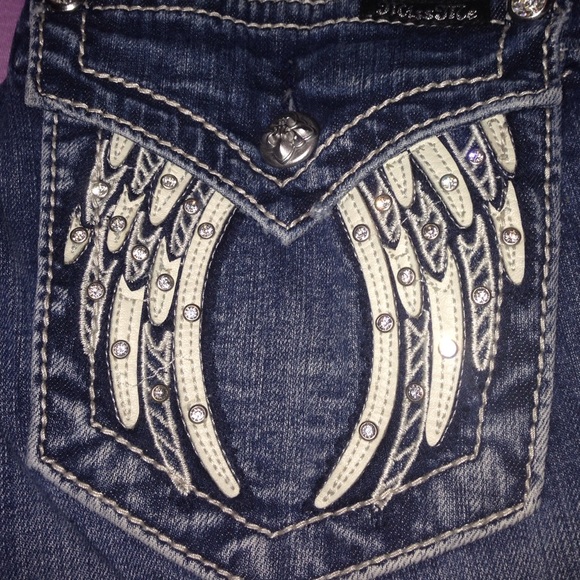 Straight leg leather and stud angel wing miss me
