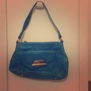 Turquoise leather B. Makowski handbag.
