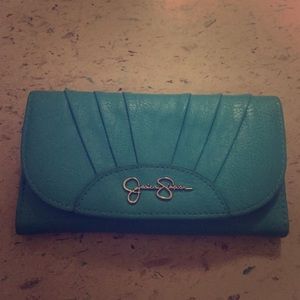 Turquoise Jessica Simpson fold-out wallet.