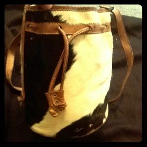 Pony Hair Cow print Leather Saddle Bag