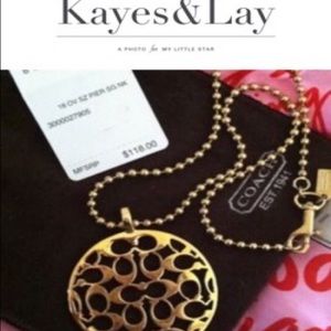 Authentic coach medallion necklace.