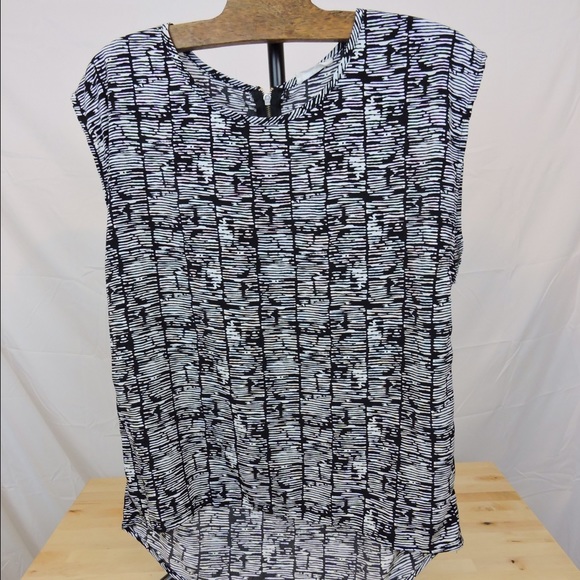 Black and white cap sleeve chiffon blouse.